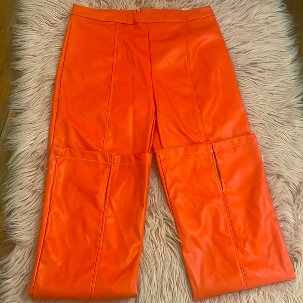 A beautiful pair of faux leather orange pants